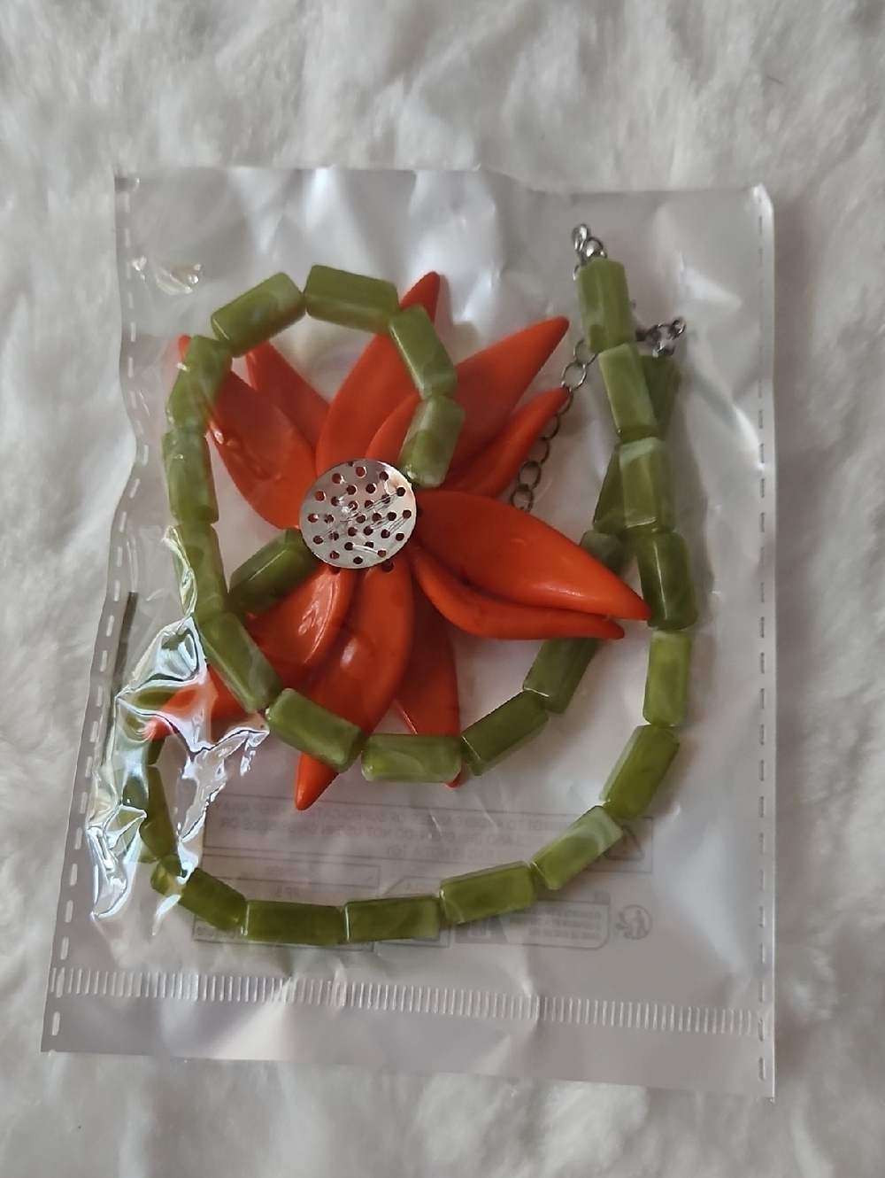 Green Beaded Necklace with Orange Flower Pendant